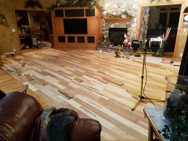 Our Custom Hardwood Flooring Contractors are nearly finished with this Wisconsin Living Room