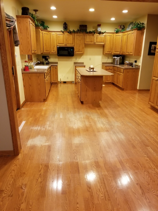 A Kitchen Floor Before Art Floors' Contractors Refinished it