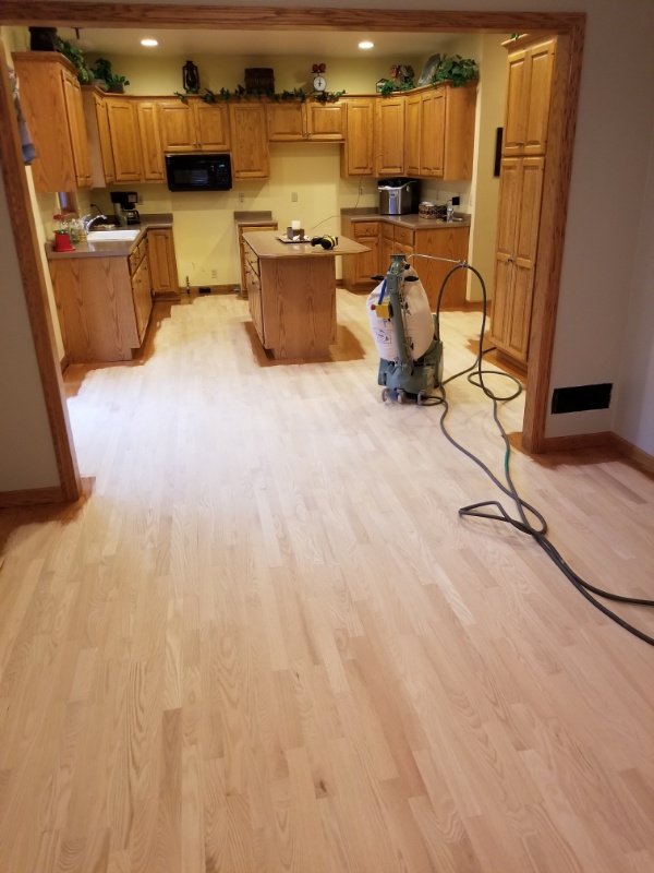 Our Flooring Contractors prepare to refinish this Wisconsin Kitchen