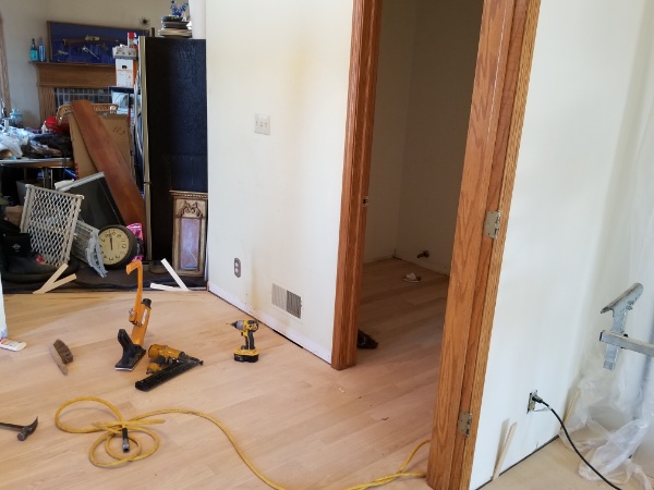 Flooring Contractors finish a Custom Hardwood Closet Floor in Wisconsin