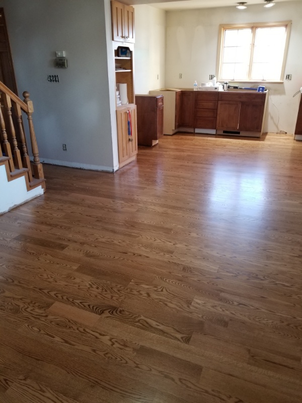 A completed hardwood living room installation A completed installation by the Art Wood flooring contractors in Wisconsin