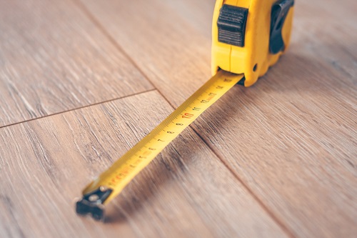 Tape Measure on Hardwood Floor