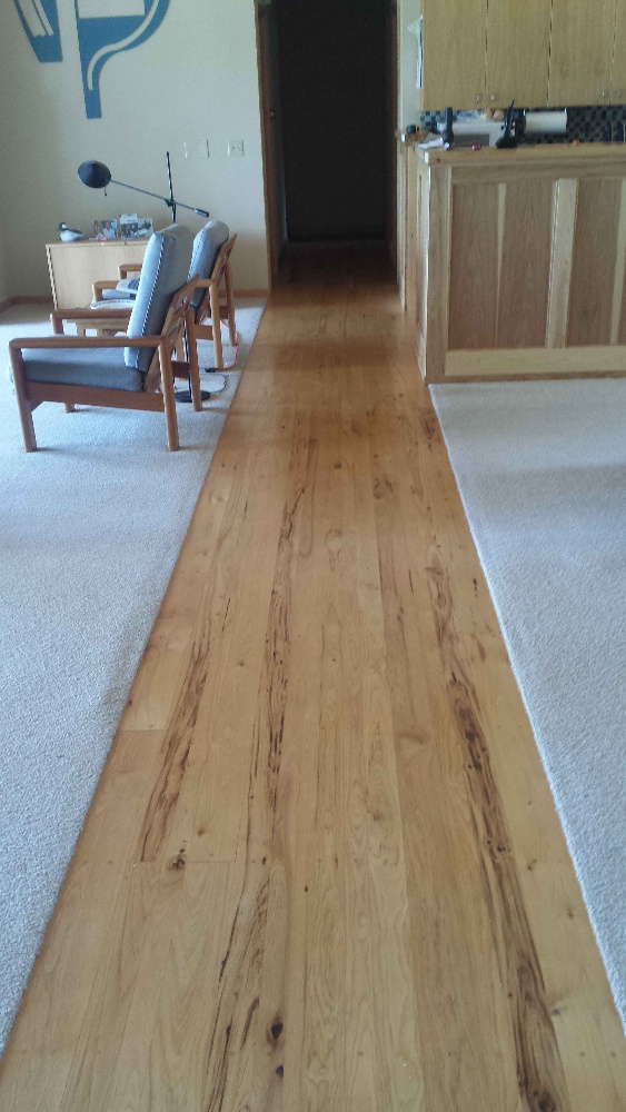 Racine Hardwood Floor Splits a Room Racine Split Hardwood Flooring